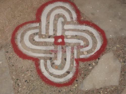 Kolam rangoli design based on a swastika
