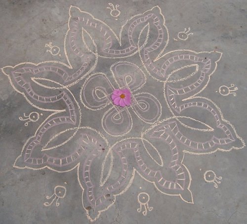Daily kolam rangoli design in chalk